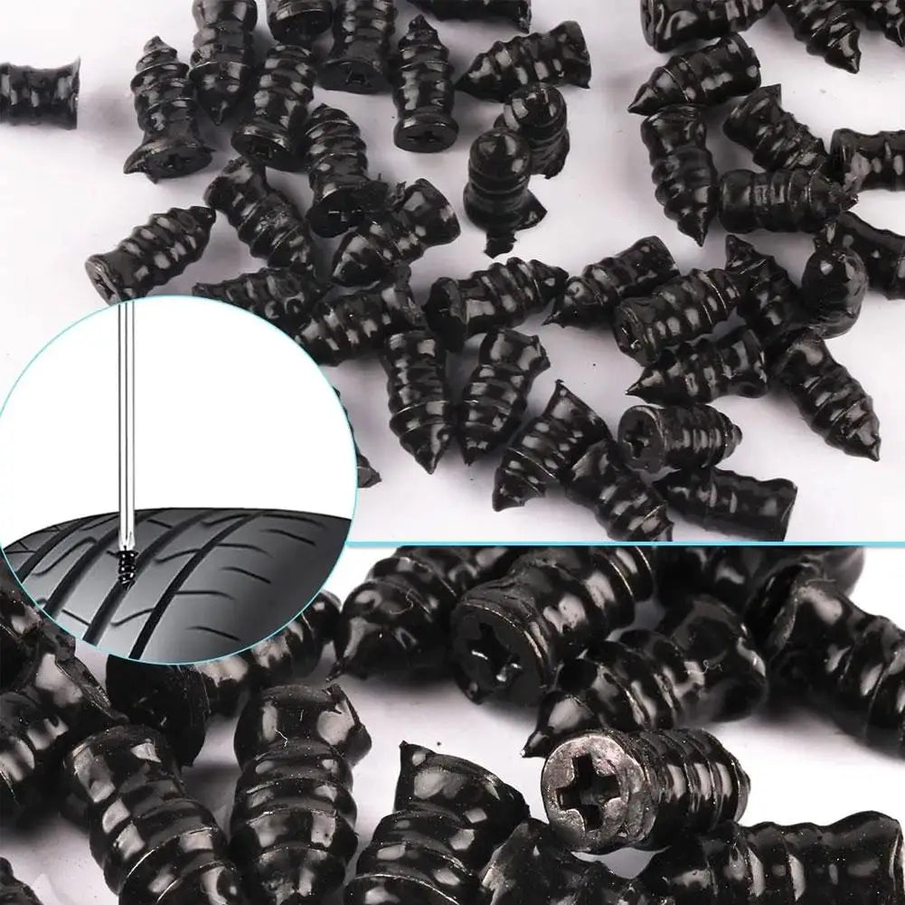 A close-up view of black car tyre puncture repair kit components, including a needle and various repair elements.