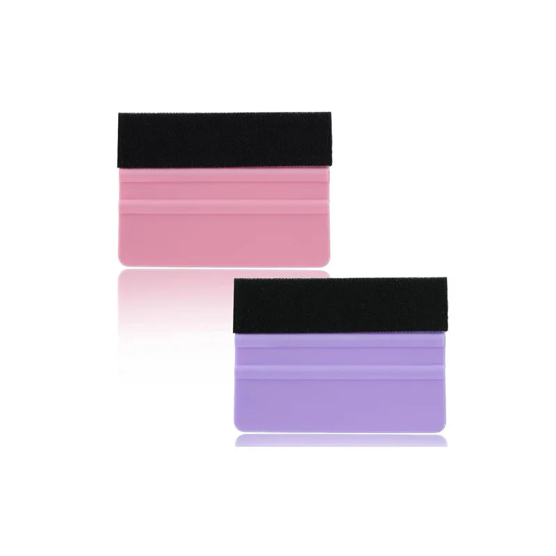 A felt squeegee tool with a black top and pink and purple silicone blades for removing vinyl decals and film.