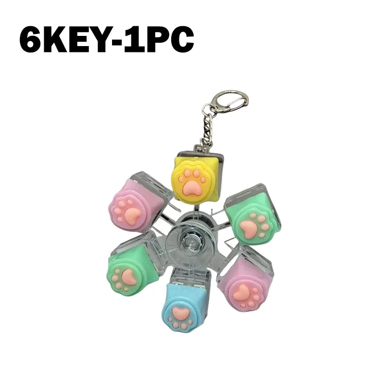 A set of six silicone paw-shaped fidget toys attached to a keychain ring.