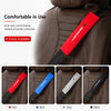 Red, blue, gray, and black universal car seat belt shoulder pads shown on a brown car seat.