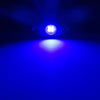 A close-up shot of a bright white LED light shining forward, illuminating a blue surface.