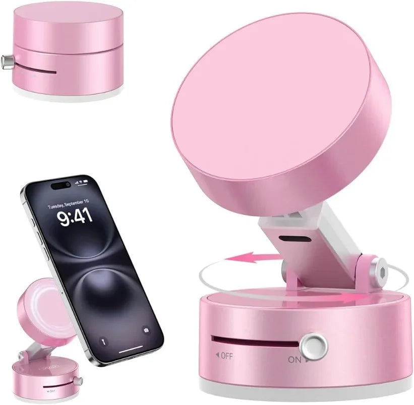 A pink heavy duty magnetic phone holder with a circular top and base, shown next to a smartphone.