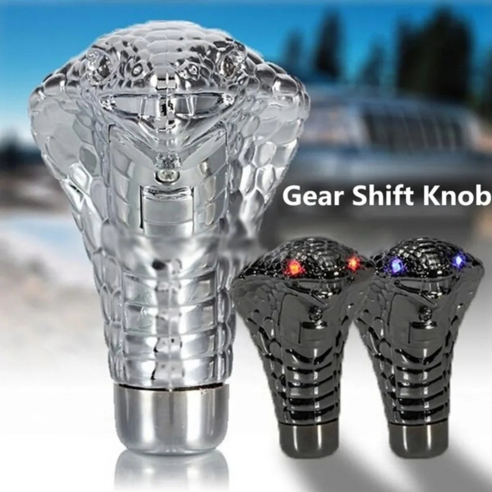 A clear plastic Cobra Snake LED gear shift knob is shown alongside two black versions.