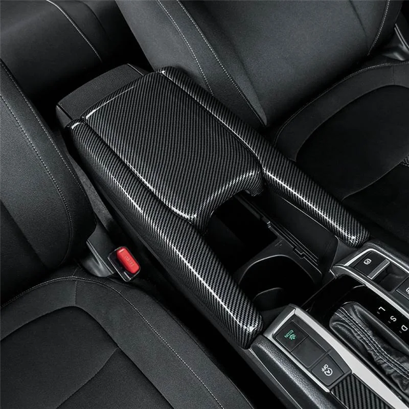 Close-up view of a black custom armrest box cover for a Honda Civic, showing textured leather and trim.