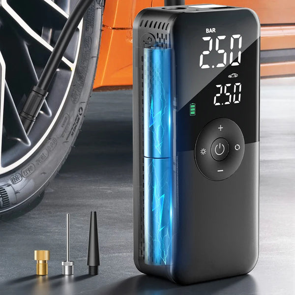 Pompe d'air numérique portable noire affichant une pression de 2,50 bar, à côté d'un pneu et d'accessoires métalliques
