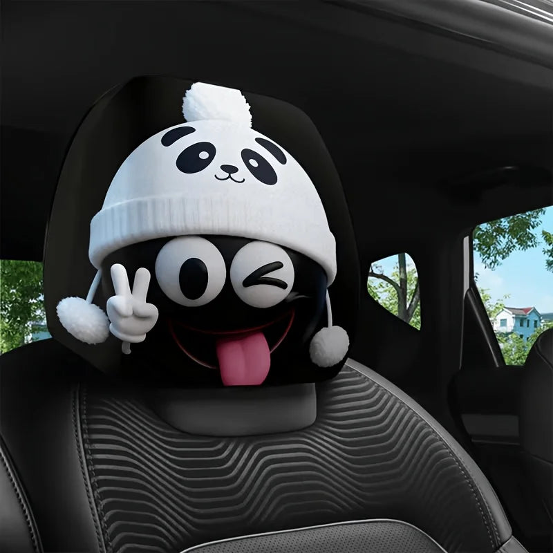 A black panda-themed headrest cover featuring a white knitted panda face with a tongue sticking out.