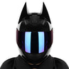 Black full face motorcycle helmet with a reflective blue visor
