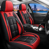 Red and black leather car seat covers with stitching and accents shown inside a vehicle.