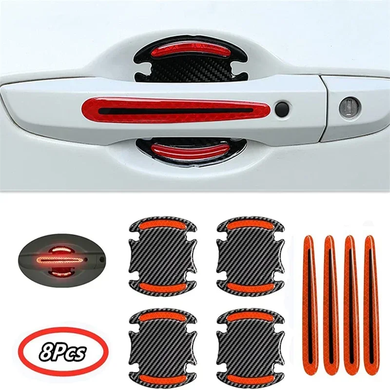 Set of eight reflective protection stickers for car door handles in black and orange.