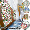 Decorative PVC window film featuring colorful floral and bird patterns applied to glass.