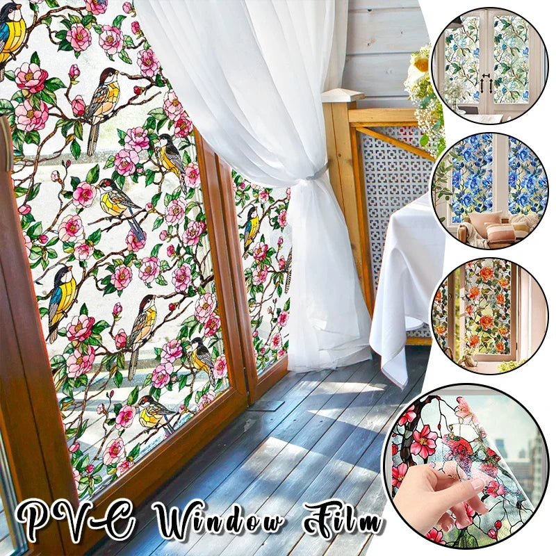 Decorative PVC window film featuring colorful floral and bird patterns applied to glass.