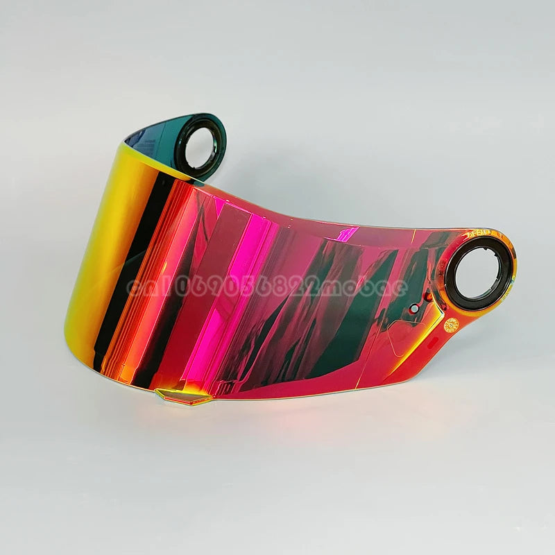 Visor de casco de motocicleta multicolor con acabado degradado en tonos rosa, naranja y amarillo vibrantes.