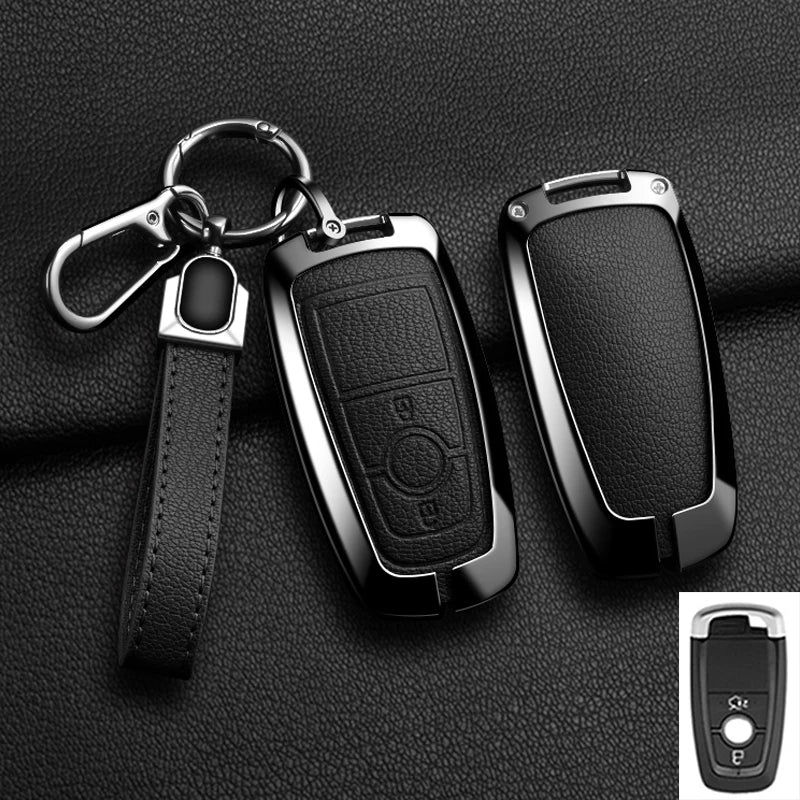 A black aluminum alloy key fob cover for a Ford vehicle, shown with its attached chain and strap.