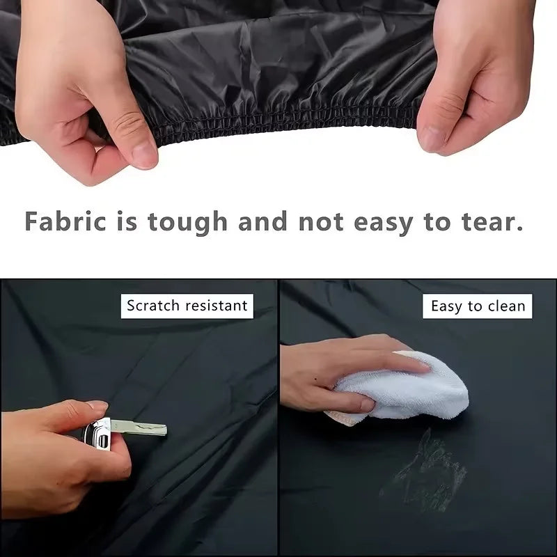 Close-up of a black motorcycle cover fabric showing its toughness and scratch resistance.