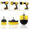 A set of three yellow and black power scrubber brushes for drill attachments, shown in various angles.