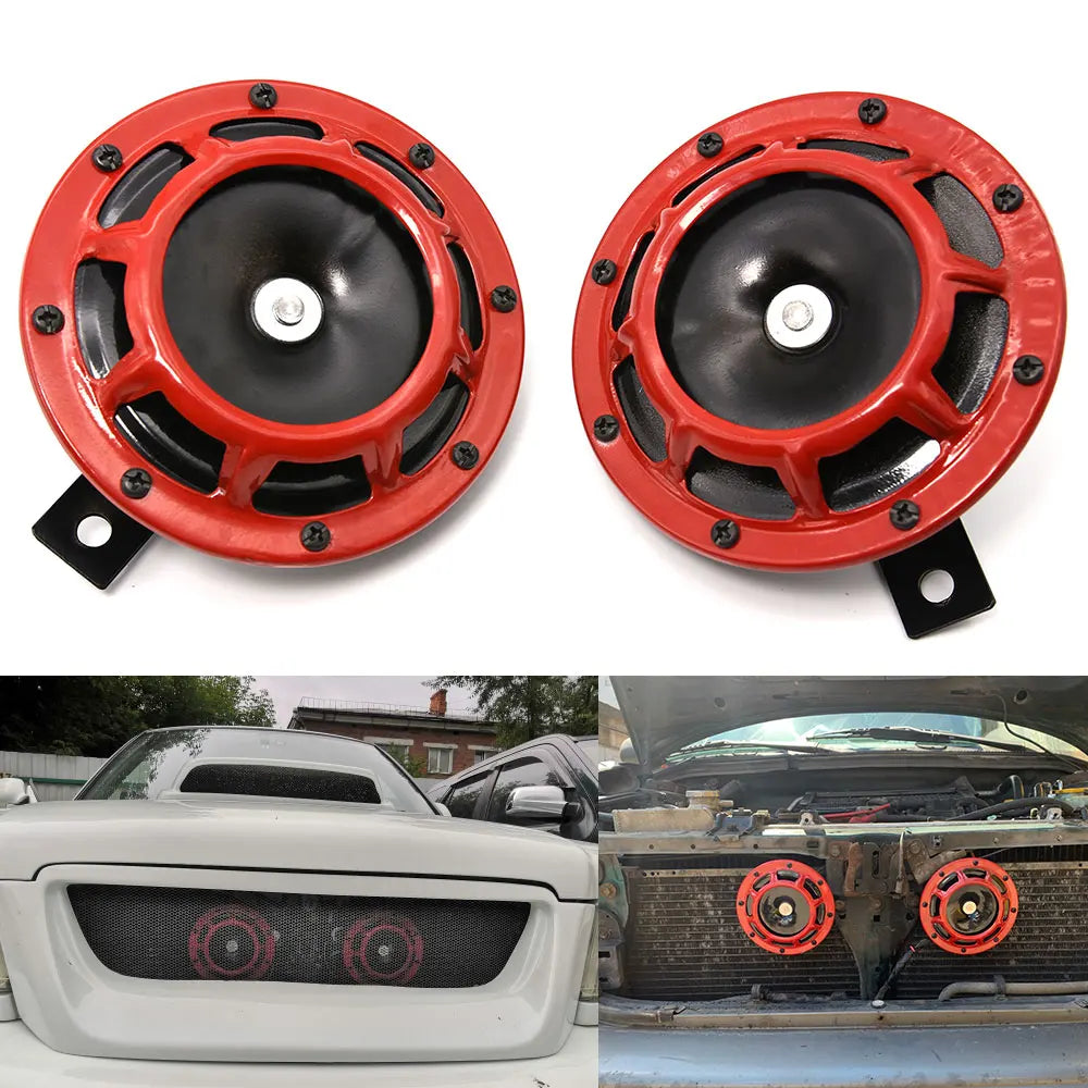 Two red electric air horn kits mounted on a vehicle grille and bumper.