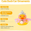 A decorative rubber duck ornament featuring a crown and pearl necklace, used for decorating cars and other items.