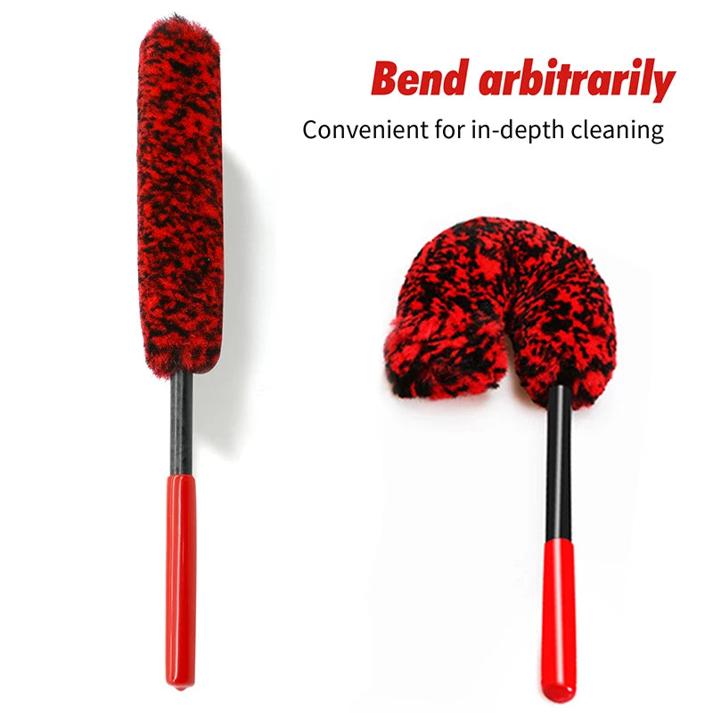 A set of three red and black wool cleaning brushes for in-depth detailing.