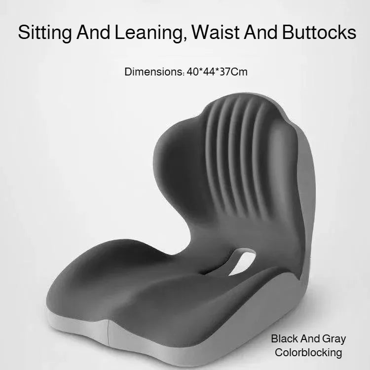 A black and gray ergonomic shell seat cushion designed for sitting and leaning with lumbar support.