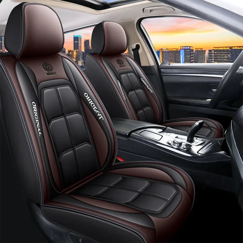 Close-up view of brown leather car seat covers installed in a vehicle interior.