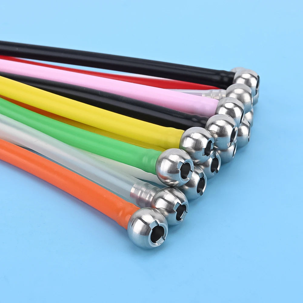 A collection of stainless steel foam cannon filters in various colors, including black, pink, yellow, green, and orange.