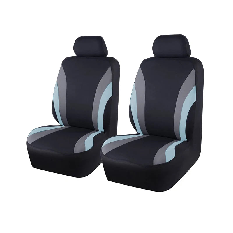 A pair of black car seat covers with light gray accents shown from the side.