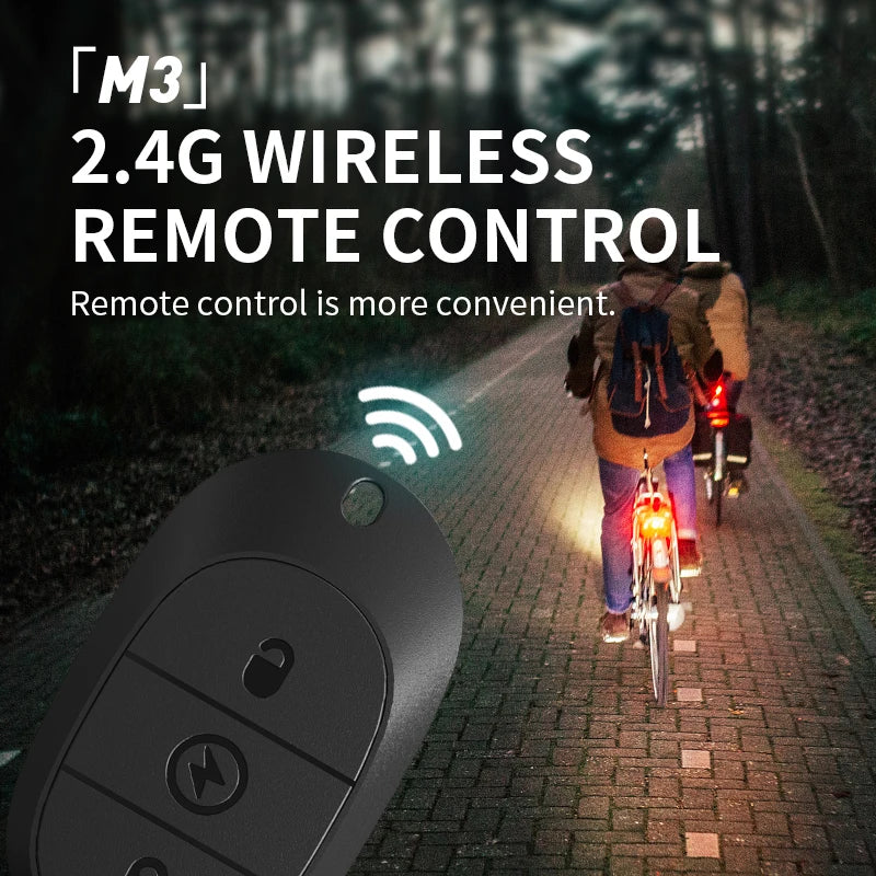 A remote control device is shown next to a bicycle riding down a paved path with trees in the background.