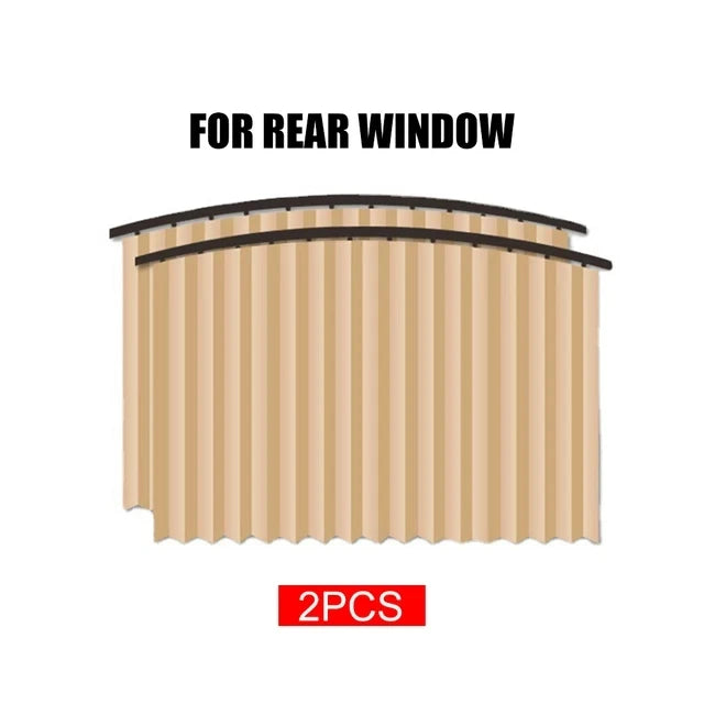Two beige magnetic car window sun shades for rear windows.