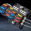 An assortment kit of blade fuses for automotive, showing various colored fuses in a black plastic holder.