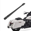 A black universal car antenna is mounted on a white motorcycle.