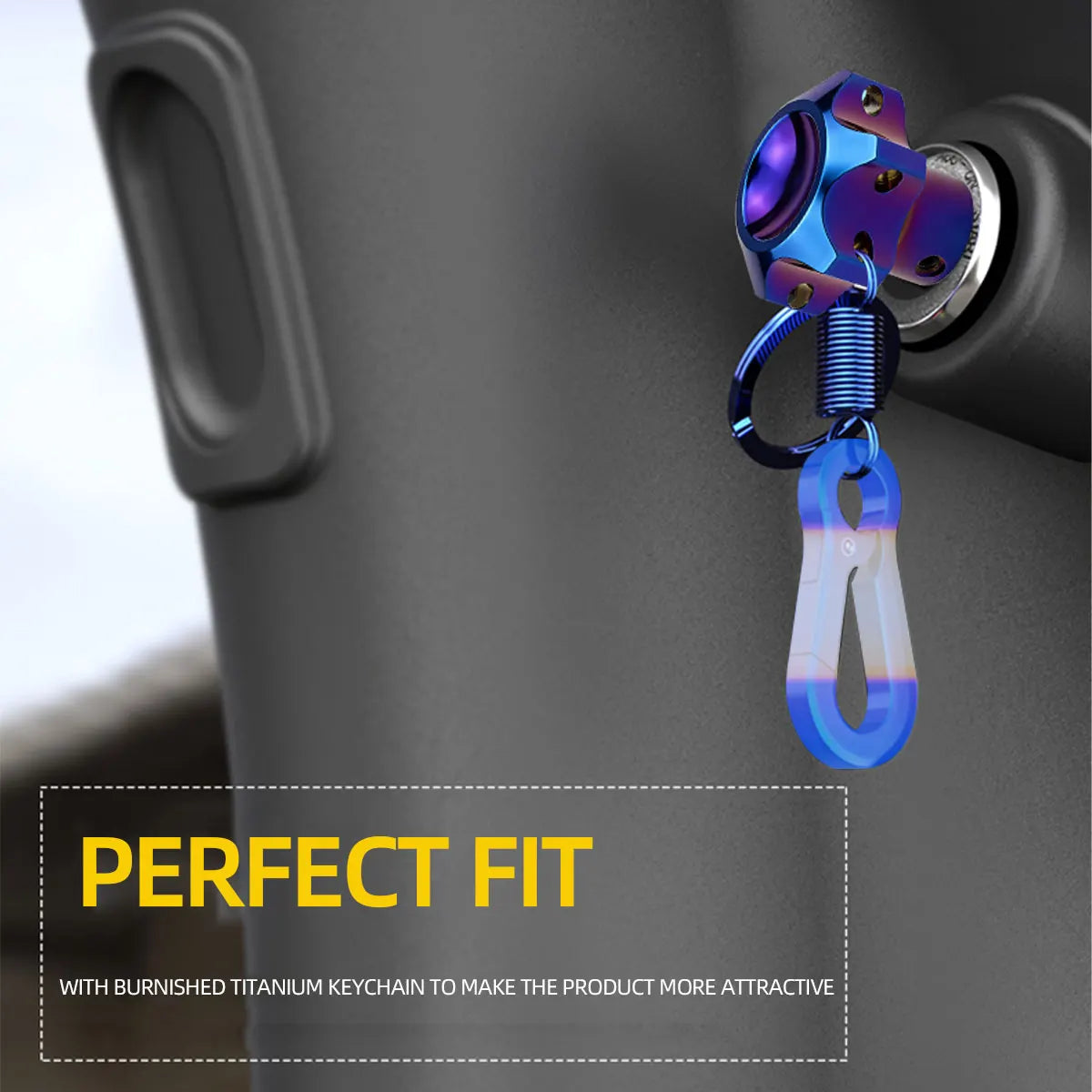 A close-up of a motorcycle product featuring a blue titanium keychain attached to a black container.