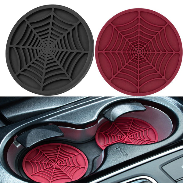 Two silicone spider web car coasters shown in black and red, with one placed inside a car cup holder.