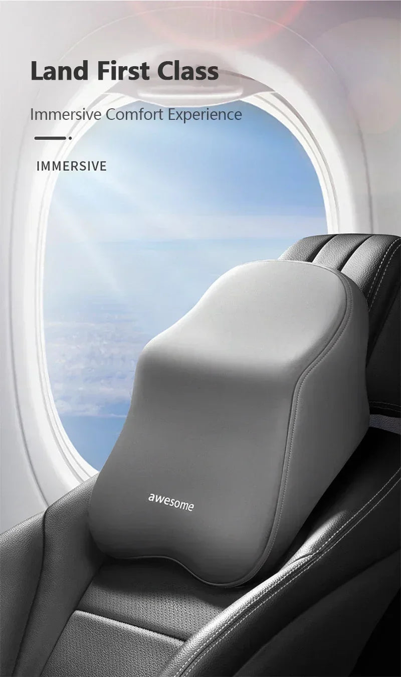A close-up of a gray ergonomic car headrest cushion designed for immersive comfort and neck support.