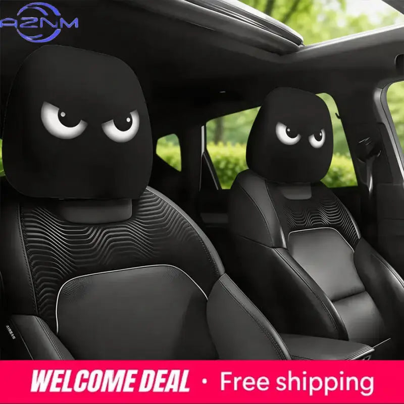 A pair of black car headrest covers with angry eyes are shown inside a car interior.