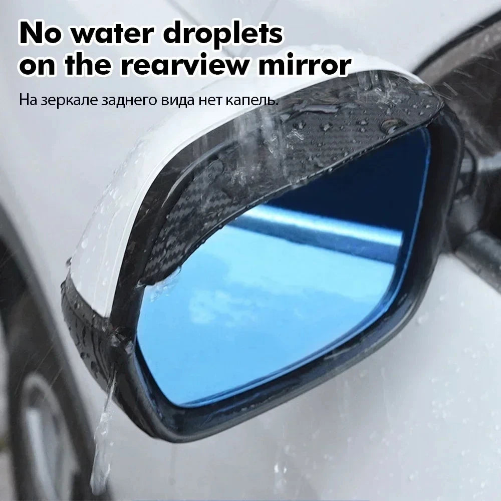 Carbon fiber rain shield protecting a car's rearview mirror from water droplets.
