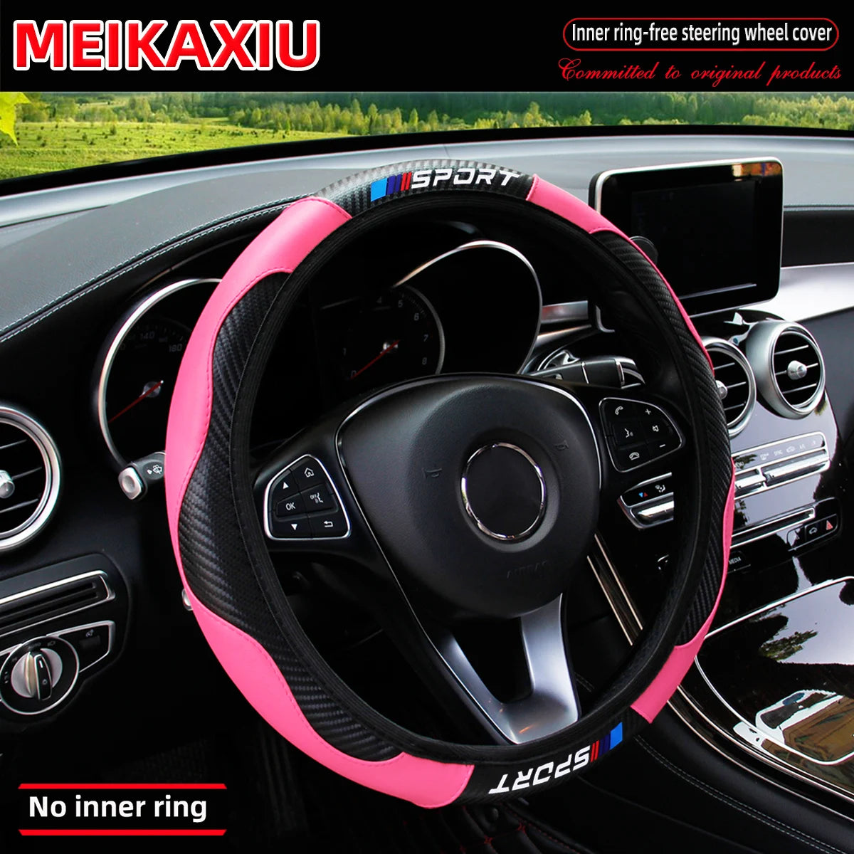 Pink and black carbon fiber steering wheel cover installed in a car interior.