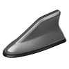 Antenne de voiture en forme de nageoire de requin gris, conçue pour améliorer le signal radio.