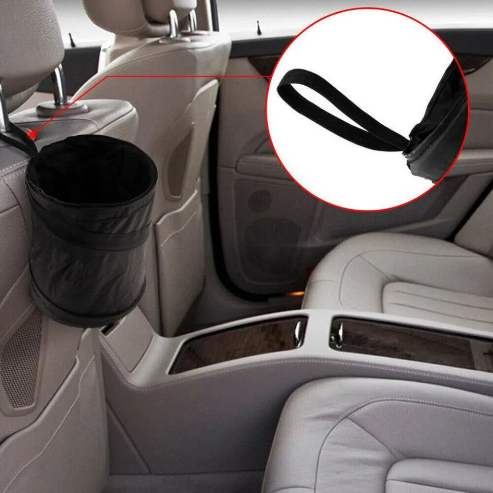 A close-up view of a black collapsible bag designed to fit into a car trash can.