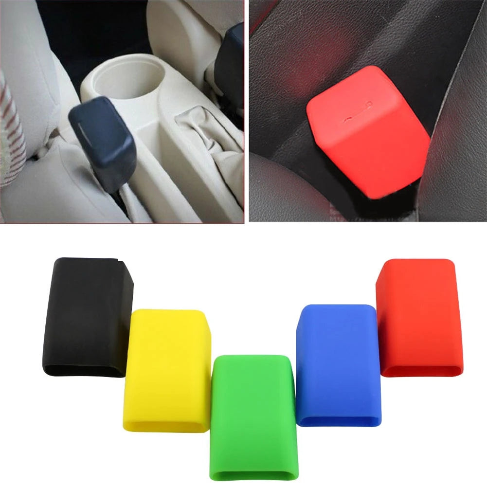 A set of silicone seat belt buckle covers in black, yellow, green, and red colors.
