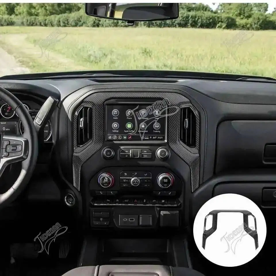 Interior view of a truck dashboard showing the center console navigation panel trim cover.
