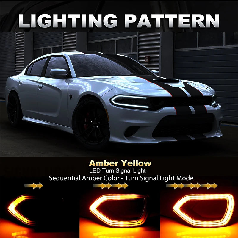 Amber yellow LED turn signal lights installed on a white Dodge Charger grill.