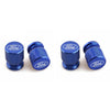 Four blue aluminum Ford car wheel valve caps shown in various angles