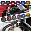 A collection of various aluminum fender washers and bolts in different colors and finishes for automotive use.