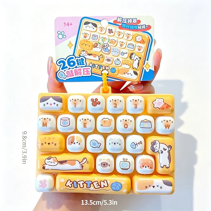 A yellow keycap stress relief button set with various cartoon characters and shapes is shown being held by a hand.