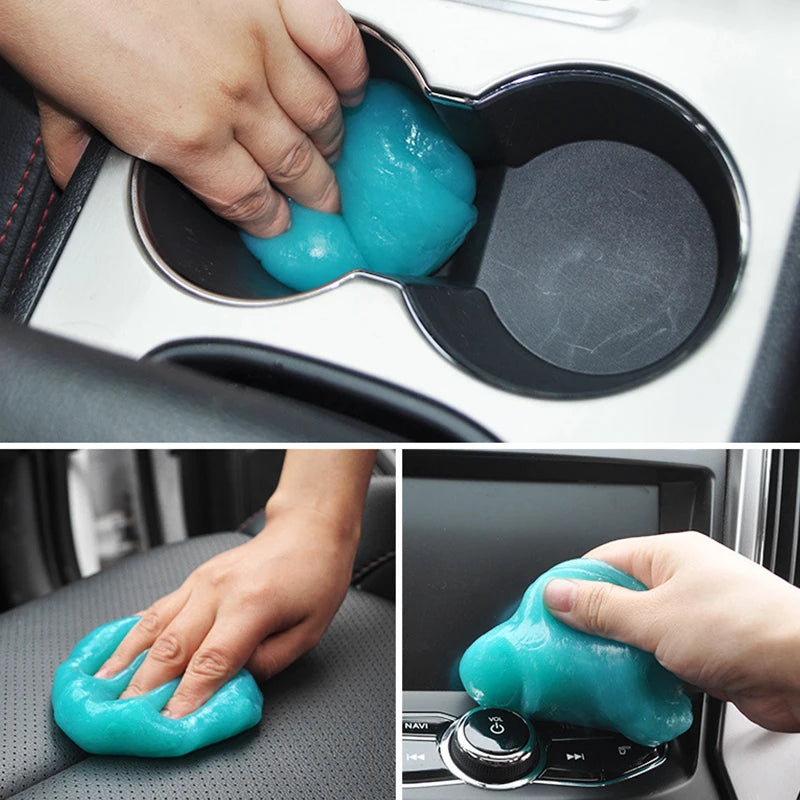 A hand is squeezing bright blue magic gel cleaner onto a car surface or interior panel.