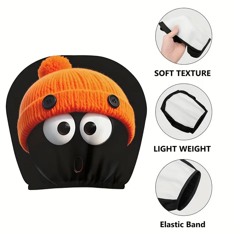 Schwarzer Plüsch-Kopfstützkissen in Form einer Cartoonfigur mit orangefarbem Strickpompon und weichem Material