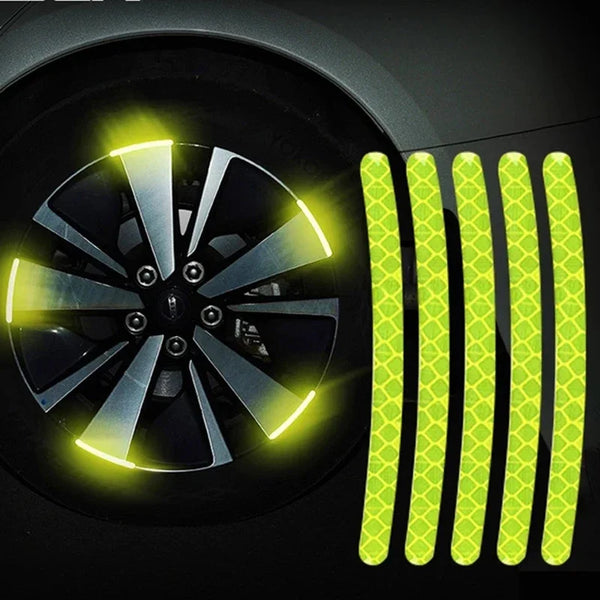 Yellow reflective decals shaped like vertical bars are shown next to a car wheel with a similar glowing effect.