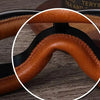 Close-up view of the brown leather frame and hinge mechanism of retro folding motorcycle windproof glasses.