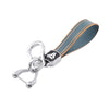 Silver durable TPU key fob case with a dark blue and orange striped leather cover.