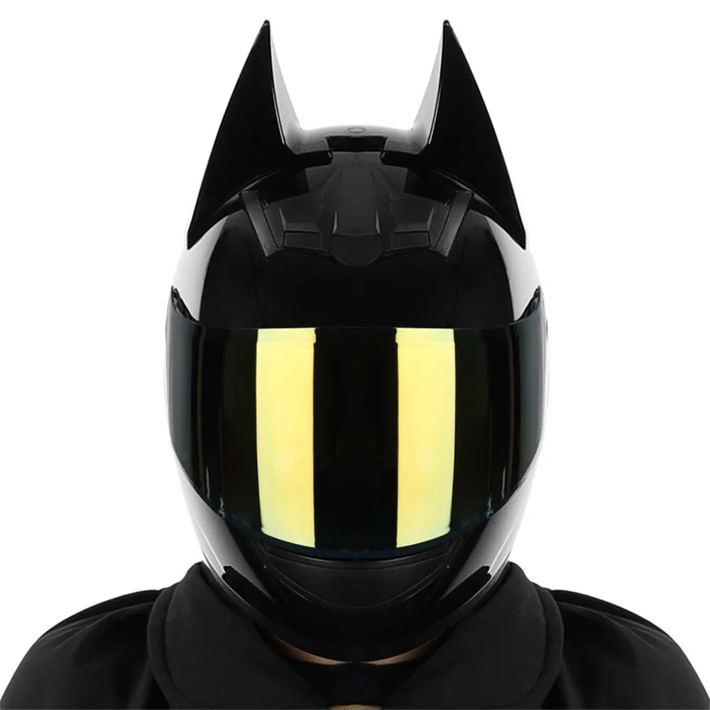 Black full face motorcycle helmet with a yellow visor and detachable horns